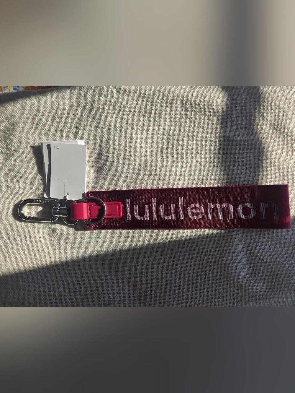 LULULEMON NEVER LOST KEYCHAIN